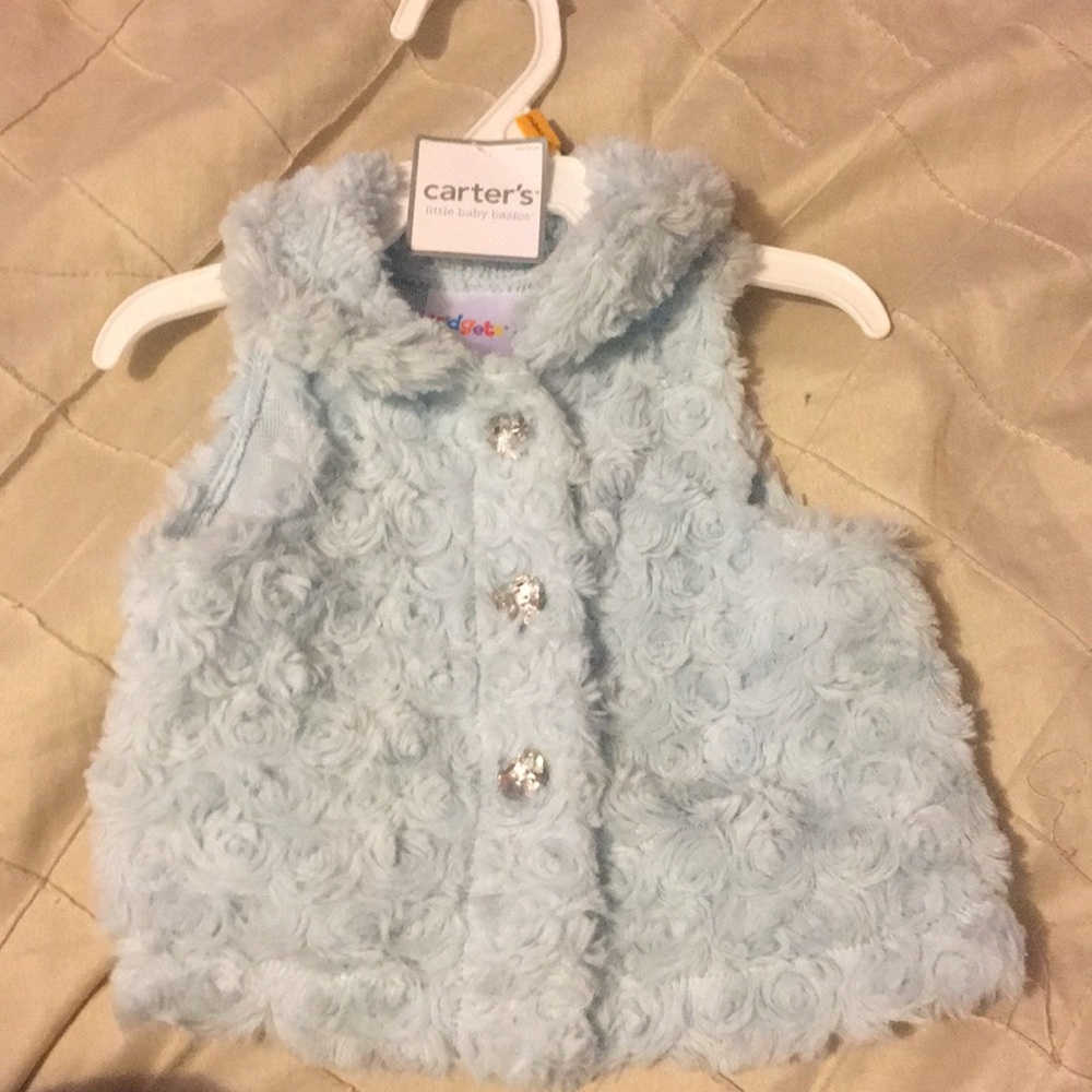 Baby fur vest.